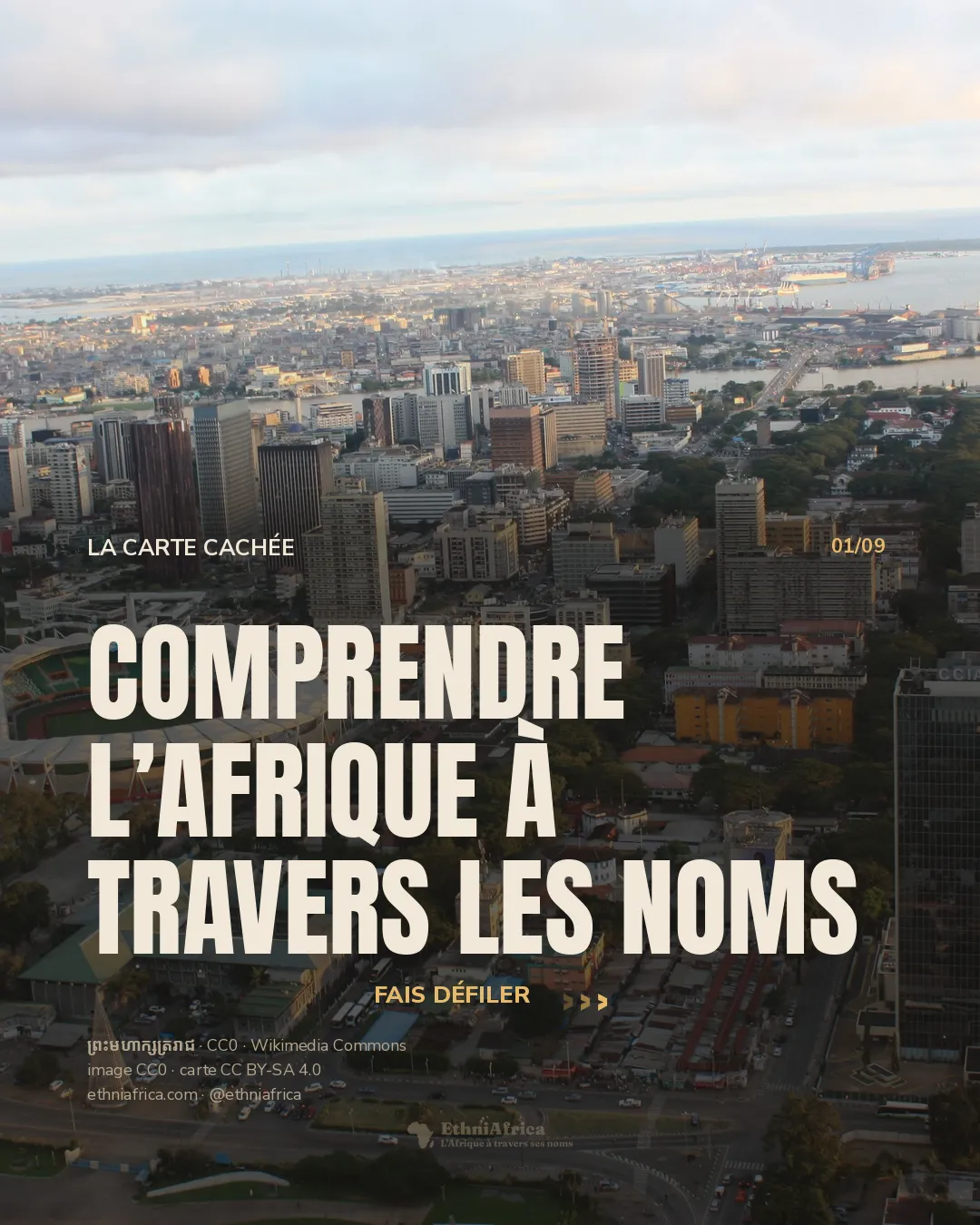 Une vue en hauteur montre des immeubles, un stade, des routes et des plans d’eau dans une ville dense.